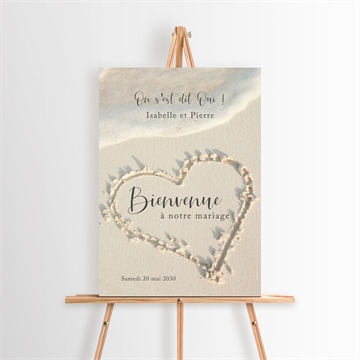 Panneau bienvenue dans le sable plié